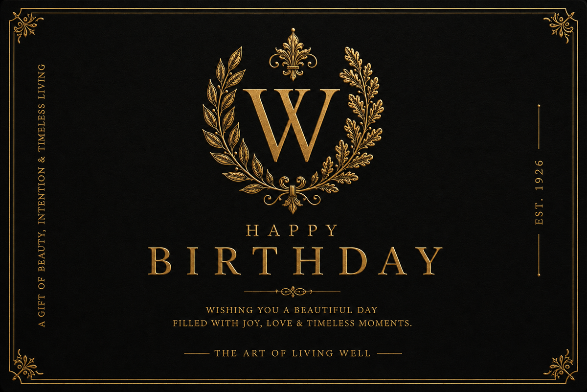 A luxury black and gold birthday card design featuring a large gold monogram 'W' inside a laurel wreath, with 'HAPPY BIRTHDAY' and elegant decorative text on a black background.