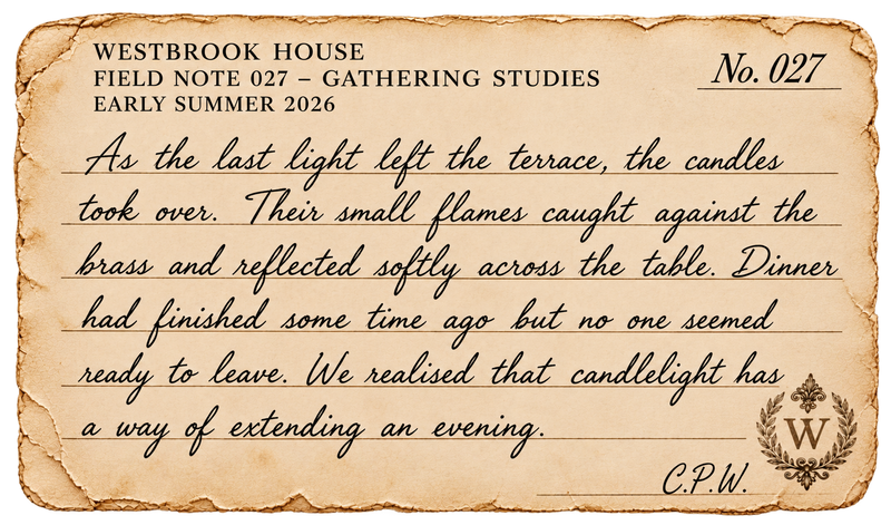 A square vintage-style parchment note with aged beige edges and handwritten text reading a reflective prose passage. The top header reads 'WESTROOK HOUSE FIELD NOTE 027 - GATHERING STUDIES EARLY SUMMER 2026' with 'No.